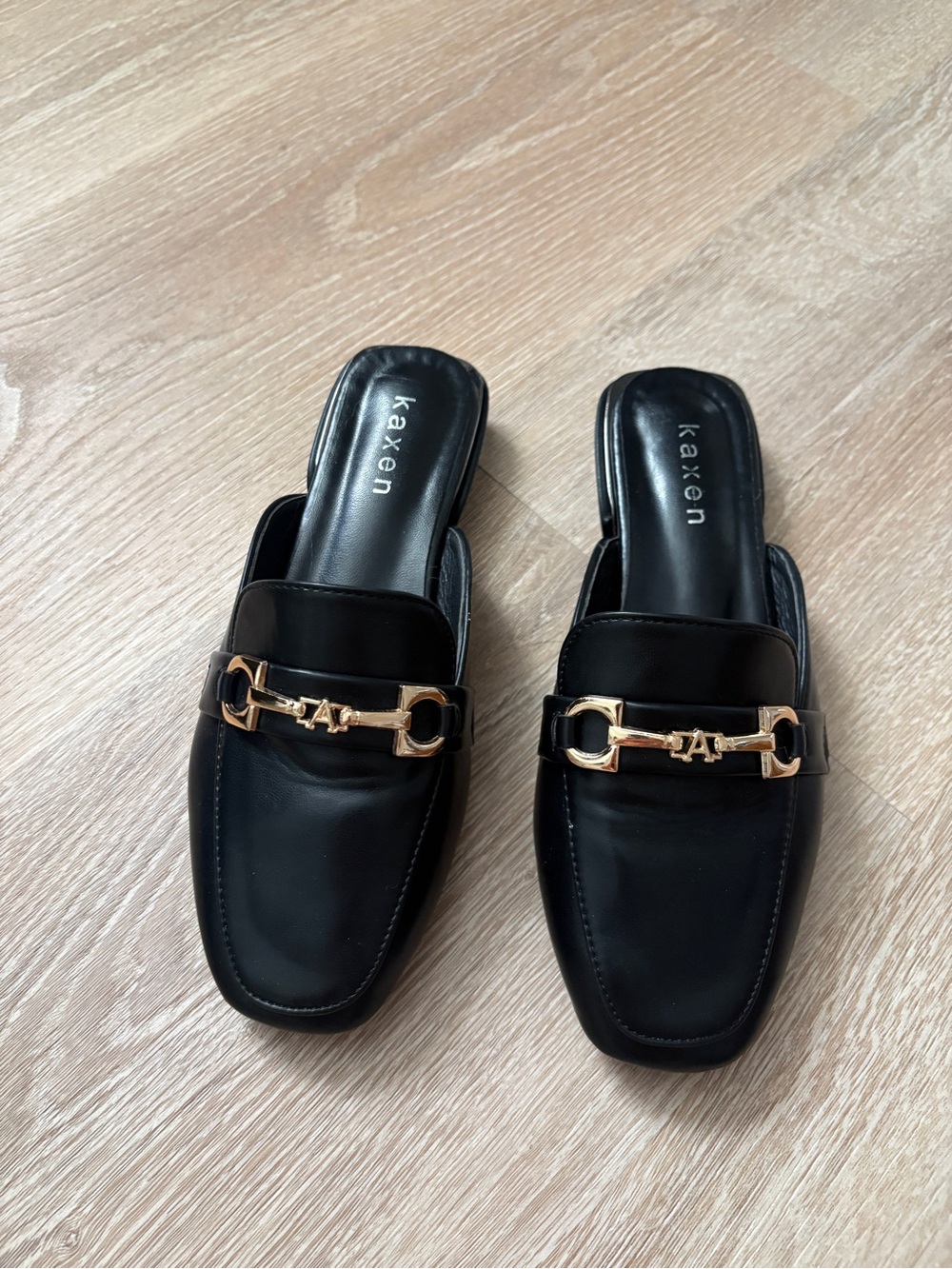 Kaxen Black Leather Slip-On Loafers with Gold Accent